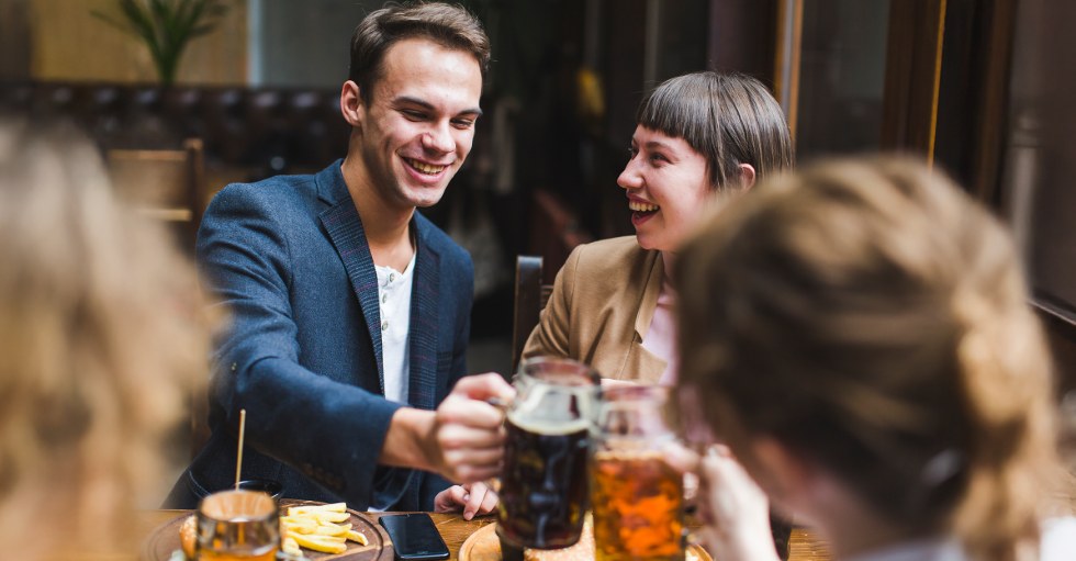 Group of friends enjoying drinks at a social gathering